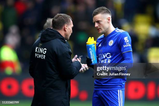 Brendan Rodgers, Manager of Leicester City chats with Jamie Vardy of Leicester City during the Premier League match between Watford FC and Leicester...