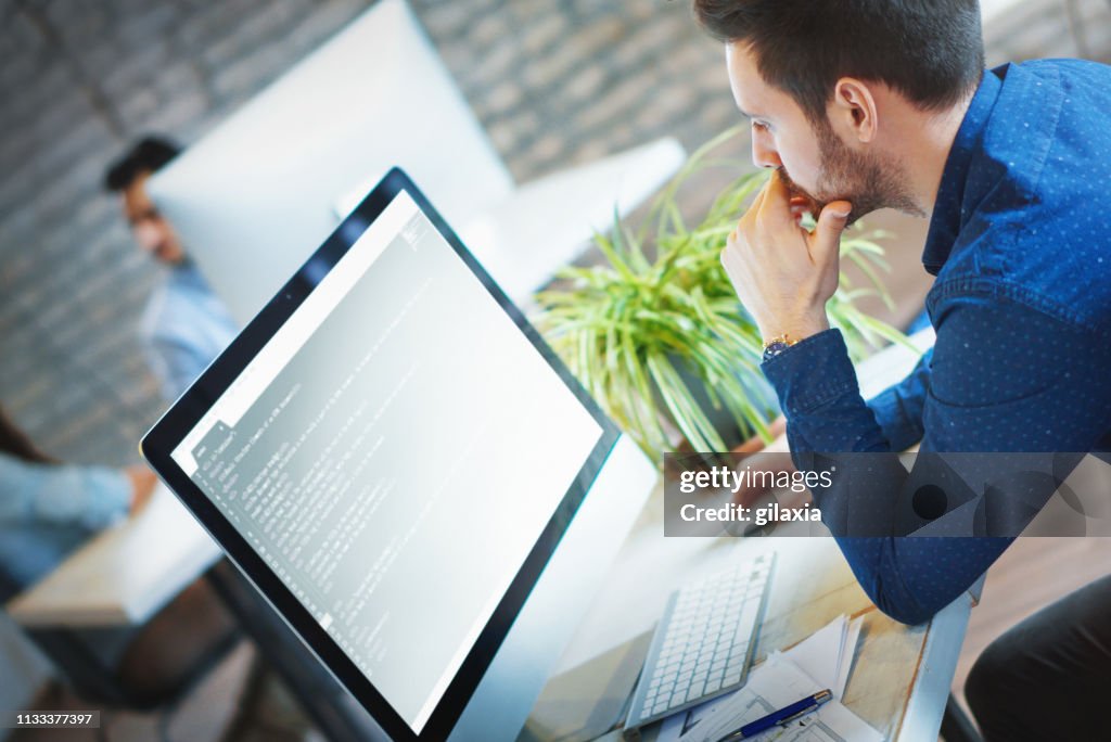 Software Developer At Work Software Developer At Work High-Res Stock Photo - Getty Images