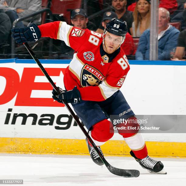 Jamie McGinn of the Florida Panthers skates with the puck against the Carolina Hurricanes at the BB&T Center on March 2, 2019 in Sunrise, Florida.