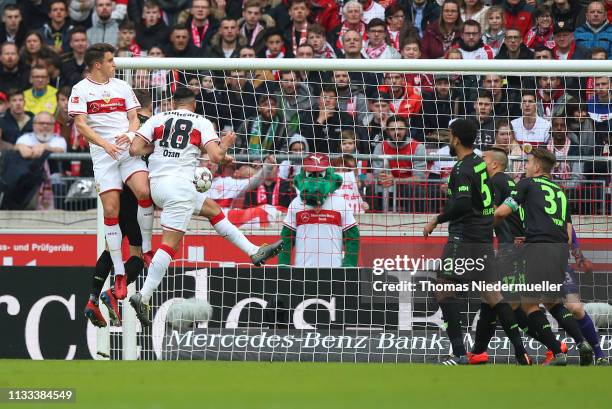 Ozan Kabak of Stuttgart scores during the Bundesliga match between VfB Stuttgart and Hannover 96 at Mercedes-Benz Arena on March 03, 2019 in...