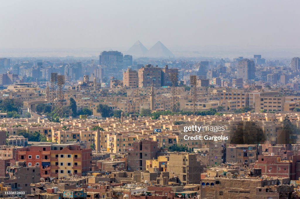 Pyramids silhouettes over Cairo, Egypt