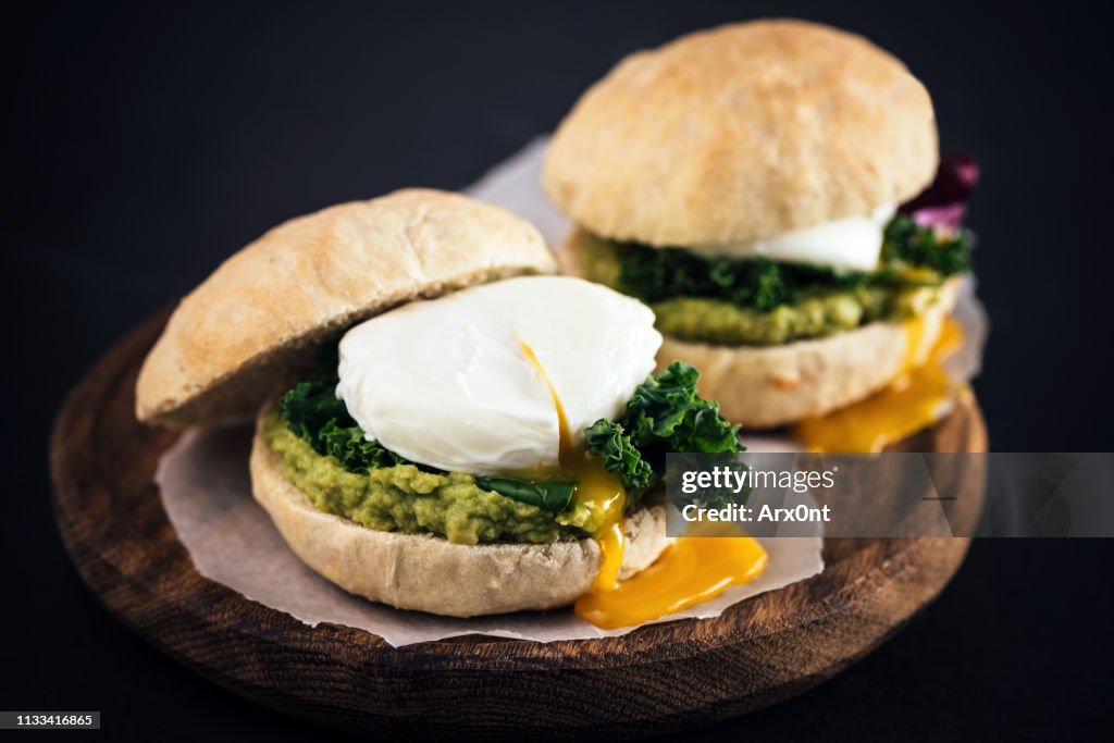 Healthy burger with poached egg, avocado