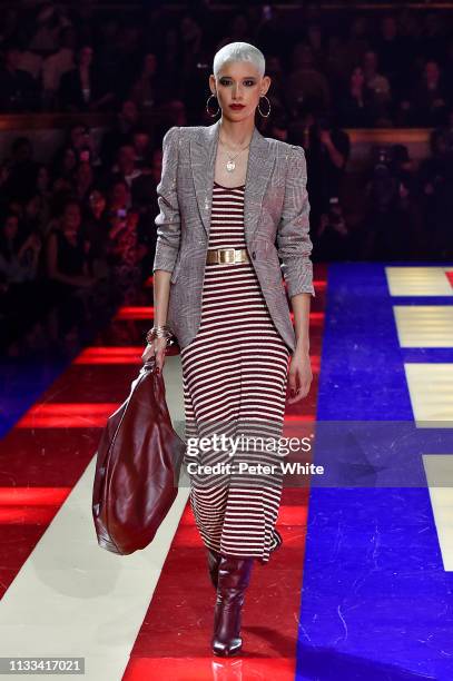 Dilone walks the runway during the Tommy Hilfiger TOMMYNOW Spring 2019 : TommyXZendaya Premieres at Theatre des Champs-Elysees on March 02, 2019 in...