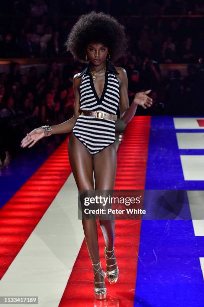 Model walks the runway during the Tommy Hilfiger TOMMYNOW Spring 2019 : TommyXZendaya Premieres at Theatre des Champs-Elysees on March 02, 2019 in...