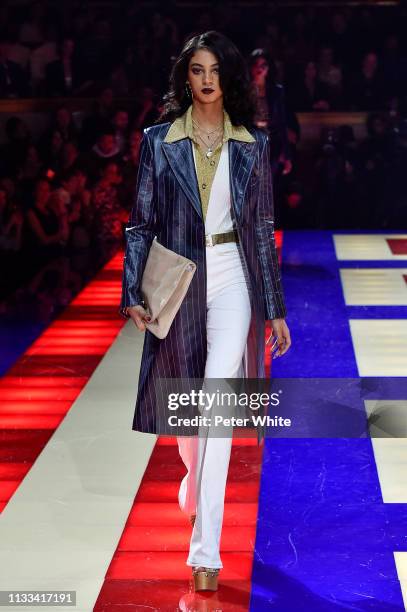 Model walks the runway during the Tommy Hilfiger TOMMYNOW Spring 2019 : TommyXZendaya Premieres at Theatre des Champs-Elysees on March 02, 2019 in...