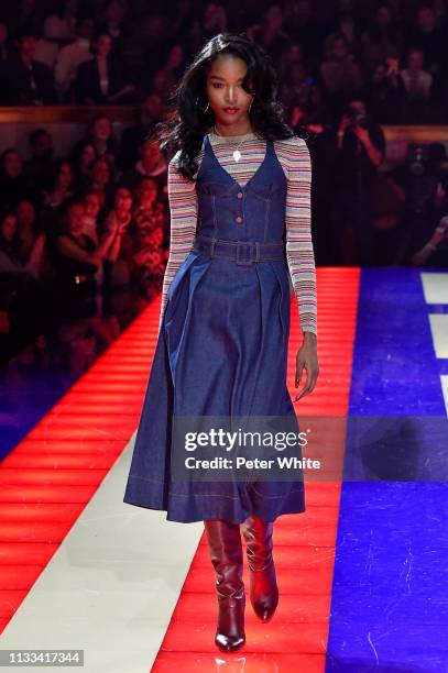 Model walks the runway during the Tommy Hilfiger TOMMYNOW Spring 2019 : TommyXZendaya Premieres at Theatre des Champs-Elysees on March 02, 2019 in...