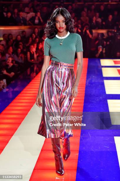 Model walks the runway during the Tommy Hilfiger TOMMYNOW Spring 2019 : TommyXZendaya Premieres at Theatre des Champs-Elysees on March 02, 2019 in...