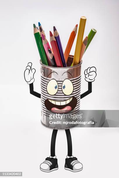 happy pencil holder. pencil with arms and legs, also has a very nice face. - grupo de objetos stock-fotos und bilder
