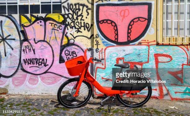 An Uber-Jump electric bicycle is parked by the Ciclovia Lisboa Cidade by Tagus Ricer in Cais Gás on March 03, 2019 in Lisbon, Portugal. Starting...