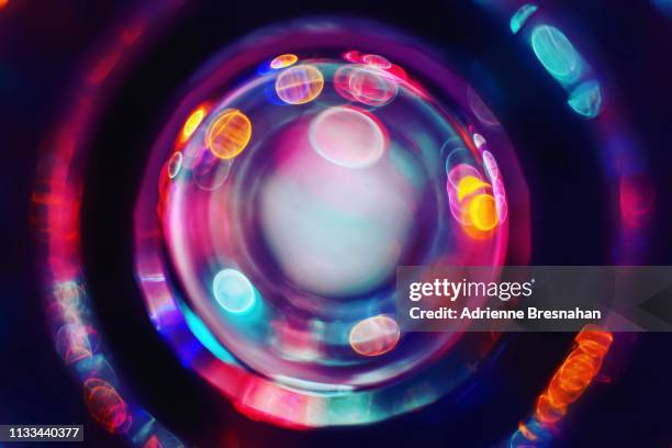 cosmic color circles and dots - en orbite autour photos et images de collection
