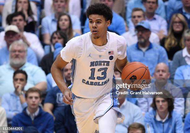 Cameron Johnson of the North Carolina Tar Heels moves the ball against the Syracuse Orange during their game at the Dean Smith Center on February 26,...