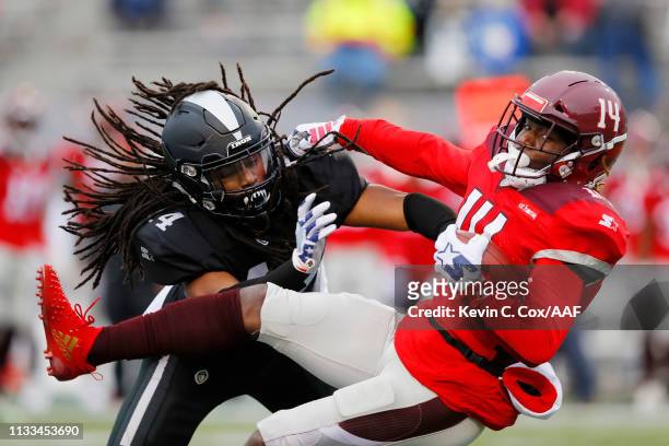 Joe Powell of the Birmingham Iron tackles De'Marcus Ayers of the San Antonio Commanders during the first half in an Alliance of American Football...