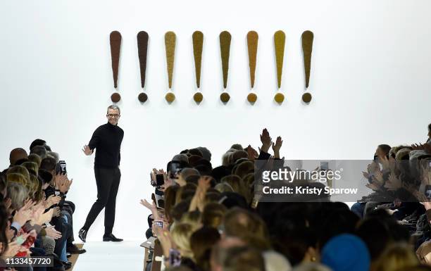 Designer Albert Kriemler acknowledges the audience during the Akris show as part of the Paris Fashion Week Womenswear Fall/Winter 2019/2020 on March...