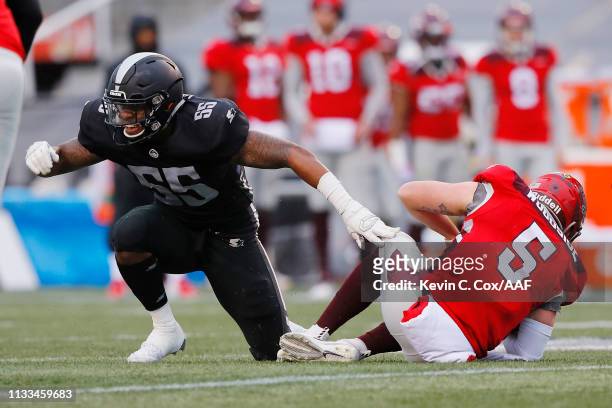 Beniquez Brown of the Birmingham Iron celebrates after sacking Logan Woodside of the San Antonio Commanders during the first half in an Alliance of...
