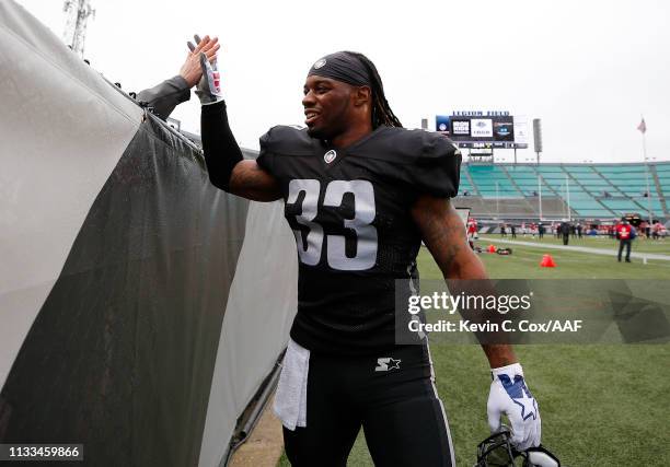 Trent Richardson of the Birmingham Iron greets a fan before an Alliance of American Football game against the San Antonio Commanders at Legion Field...