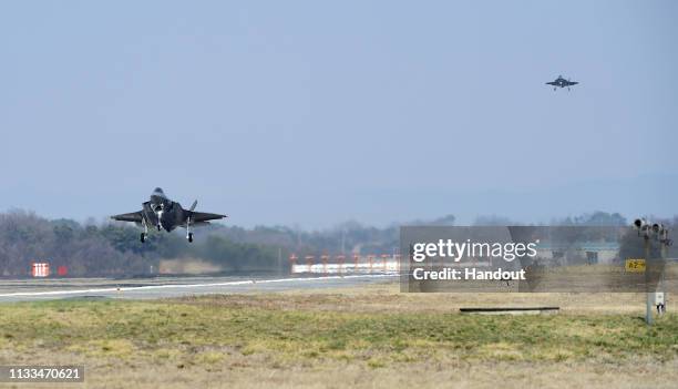 In this photo provided by South Korea Defense Acquisition Program Administration, a U.S. F-35A fighter jet lands at Chungju Air Base on March 29,...