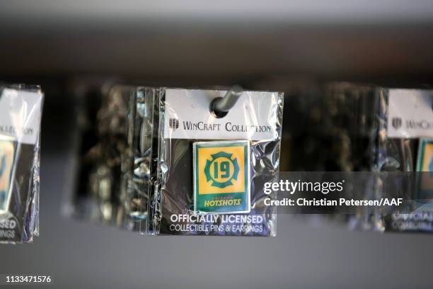 Arizona Hotshots pins with the logo are seen in the shop before the start of the Alliance of American Football game between the Atlanta Legends and...