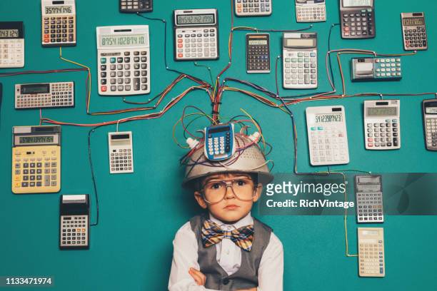 young nerd boy with brilliant invention - nerd fun stock pictures, royalty-free photos & images