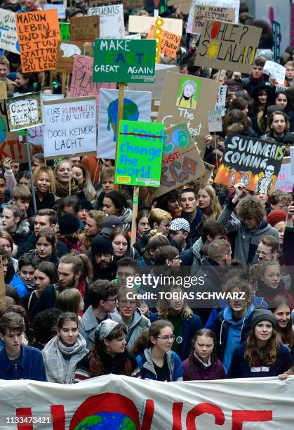 German climate activist Luisa Marie Neubauer and Swedish climate activist Greta Thunberg take part in a "Fridays for Future" demonstration for a...