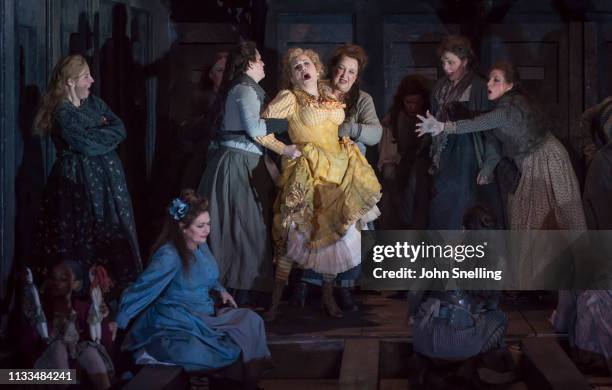 Janis Kelly as Polly Nichols with the Company performs on stage in a production of Iain Bell's Jack The Ripper by the English National Opera at...