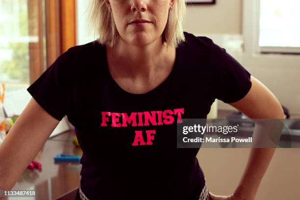 feminist af - kitchen - graphic t shirt stock pictures, royalty-free photos & images