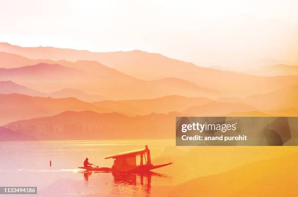 sailing boat on the alpine lake, abstract misty mountain range colourful wallpaper digital art gradiant pastel dramatic backdrop - srinagar stock pictures, royalty-free photos & images