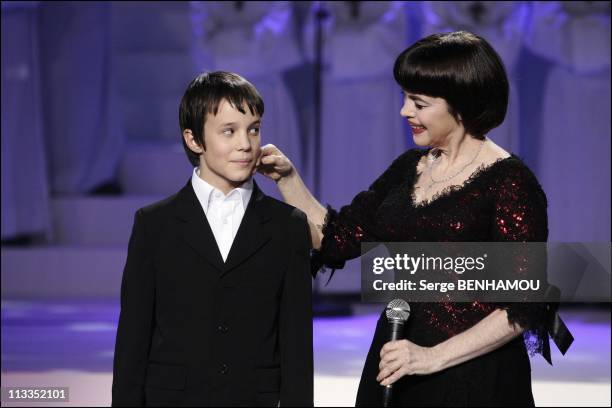 Mireille Mathieu And Tina Arena On The 100 Th Christmas Of 'Les Petits Chanteurs A La Croix De Bois' Tv Show In Paris, France On December 04, 2006 -...