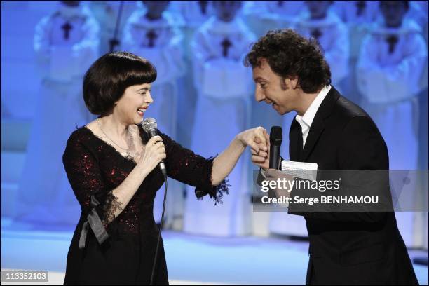 Mireille Mathieu And Tina Arena On The 100 Th Christmas Of 'Les Petits Chanteurs A La Croix De Bois' Tv Show In Paris, France On December 04, 2006 -...