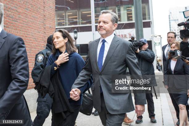 Bill McGlashan, a former top executive at TPG Growth LLC who was fired after he was charged, center, arrives at federal court in Boston,...