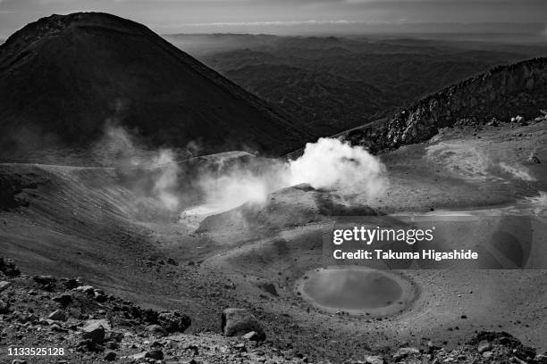 eye of the volcano - モノクロ stock pictures, royalty-free photos & images