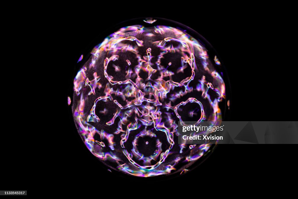 Cymatic patter of water under different frequency sound driven