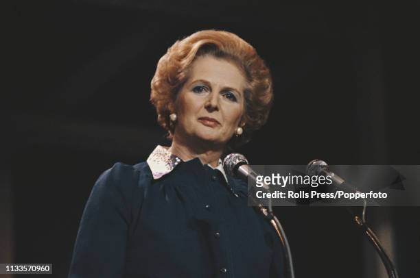 British Conservative Party politician and Leader of the Opposition, Margaret Thatcher delivers the keynote speech from the platform at the Tory Party...