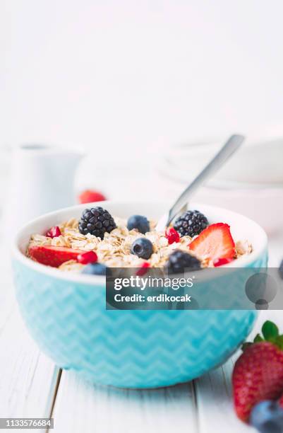 healthy muesli breakfast with fruits - oatmeal raisin stock pictures, royalty-free photos & images