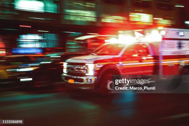 motion blur krankenwagen vereinigte staaten - rettung stock-fotos und bilder