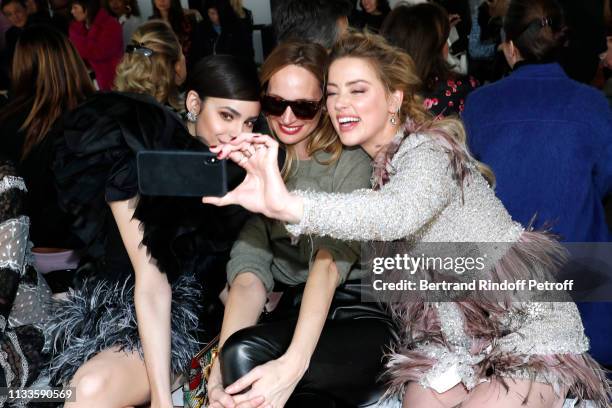 Sofia Carson, Lauren Santo Domingo and Amber Heard attend the Giambattista Valli show as part of the Paris Fashion Week Womenswear Fall/Winter...