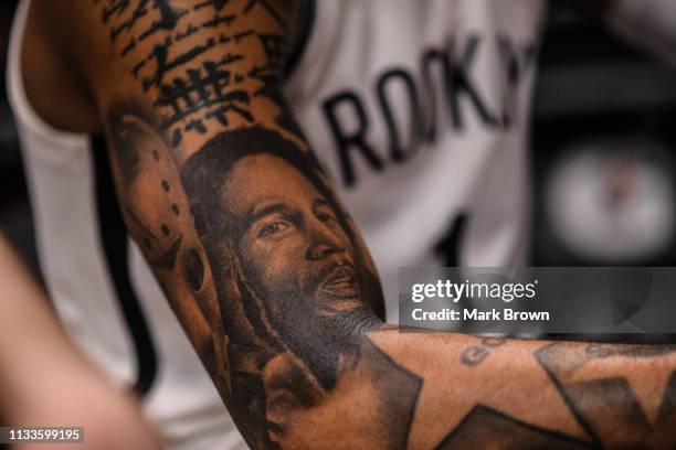 Detailed view of the tattoos of D'Angelo Russell of the Brooklyn Nets in action against the Miami Heat at American Airlines Arena on March 2, 2019 in...