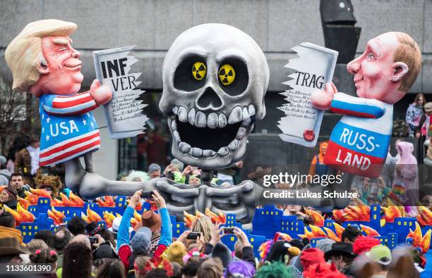 Float featuring an effigy of US president Donald Trump and Russian president Wladimir Putin makes its way through the annual Rose Monday Carnival...