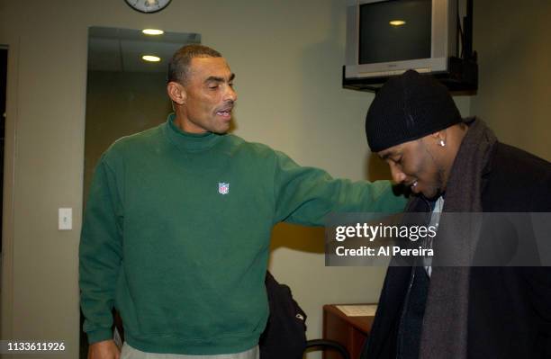 Actor Denzel Washington's son, John David Washington, meets with New York Jets Head Coach Herm Edwards in the locker room when he attends the New...