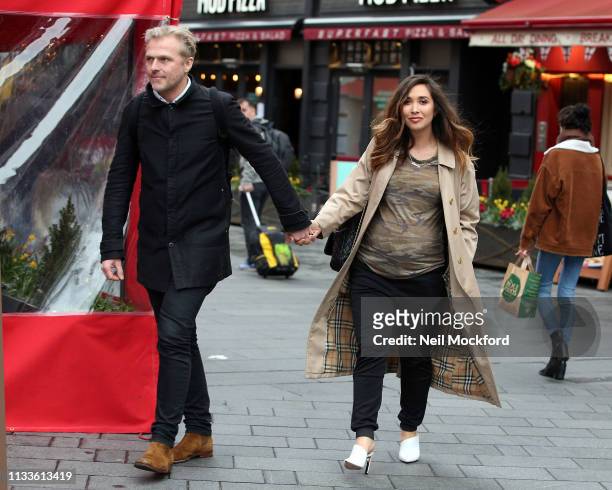 Myleene Klass and Simon Motson seen arriving at Global Radio Studios after having lunch at Wagamama on March 04, 2019 in London, England.