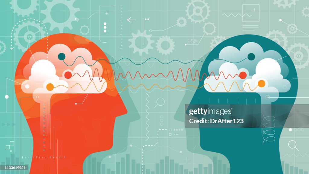 Dos cabezas conectadas con diferentes ondas cerebrales