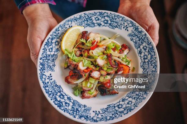 octopus ceviche with fish, onion, chili pepper and lemon - ceviche stock pictures, royalty-free photos & images