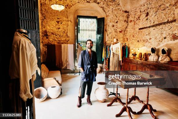 portrait of smiling boutique owner standing in shop - mexican independence stock pictures, royalty-free photos & images