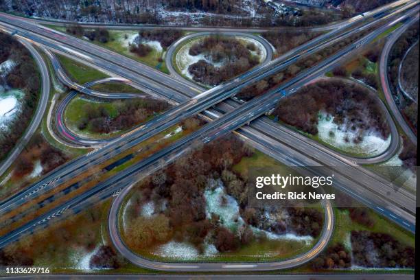 aerial view from intersection roads - tráfego stock-fotos und bilder