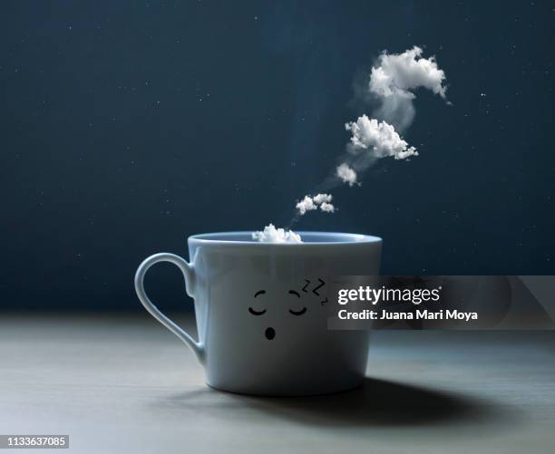 conceptual photo of a dreaming cup. - imaginación bildbanksfoton och bilder