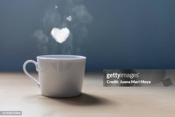 a cup of coffee with lots of love - smoke heart stock pictures, royalty-free photos & images