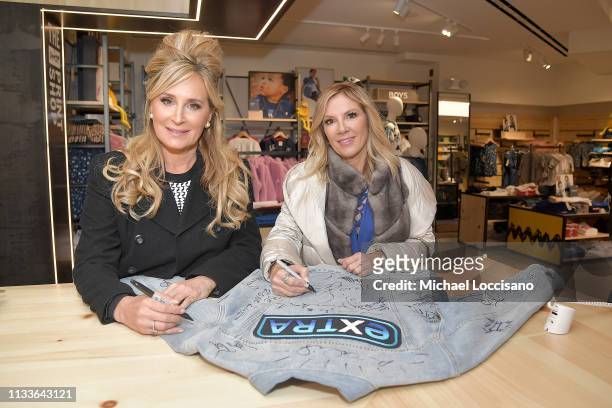 Reality TV personalities and Real Housewives of New York City Sonja Morgan and Ramona Singer visit "Extra" at The Levi's Store Times Square on March...