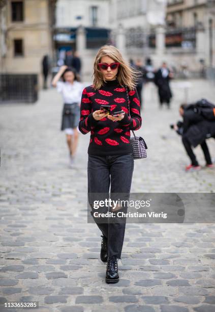 Jessica Minkoff is seen wearing ripped denim jeans outside Thom Browne during Paris Fashion Week Womenswear Fall/Winter 2019/2020 on March 03, 2019...