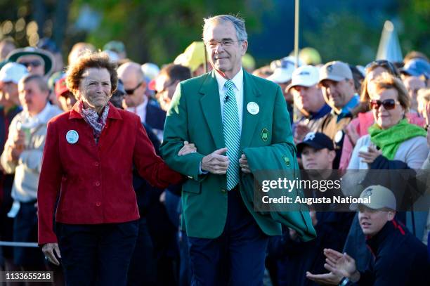 Kathleen Gawthrop, wife of Masters champion Arnold Palmer is accompanied onto the No. 1 tee by Chairman of Augusta National Golf Club and the Masters...