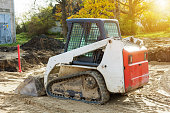 small excavatot at construction site