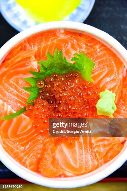 hokkaido breakfast: salmon and ikura don and pickled radish - ikura bildbanksfoton och bilder